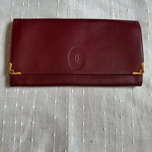 Cartier Trinity Leather Clutch in Burgundy